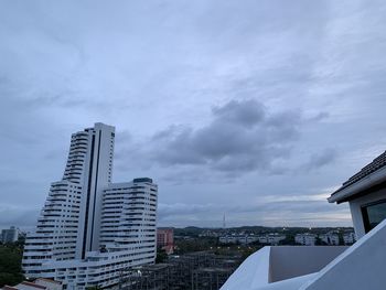 Modern buildings in city against sky