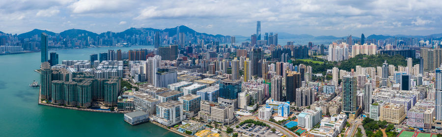 Panoramic view of modern cityscape by river