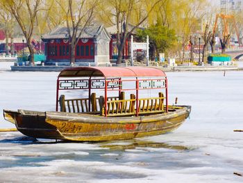Boat on frozen lake