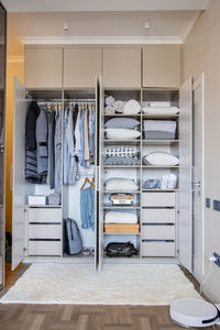 View of open wardrobe at home