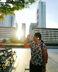 Silhouette of woman in city