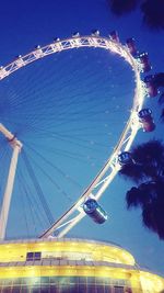 Low angle view of rope against blue sky