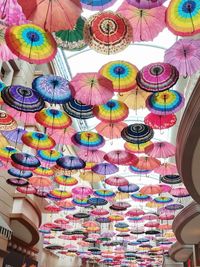 Low angle view of multi colored lanterns hanging in store