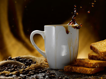 Close-up of coffee cup on table