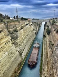 High angle view of boat in narrow canal