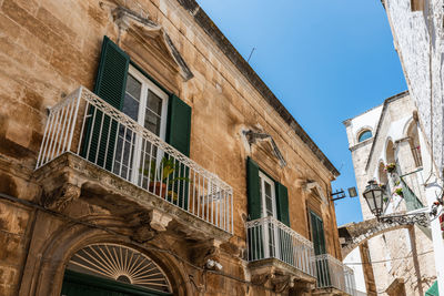 Low angle view of old building against sky