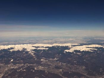 Scenic view of snowcapped mountain against sky