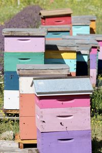 Close-up of colourful bee hives 