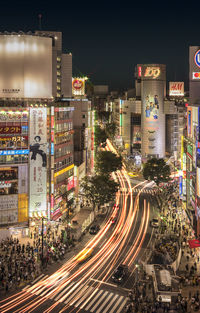 High angle view of light trails on city street at night