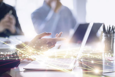 Digital composite image of man using smart phone