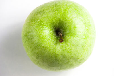 Close-up of apple against white background