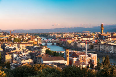 High angle view of townscape against sky during sunset