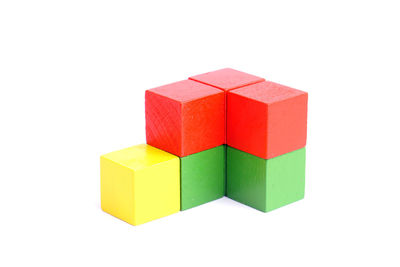 Close-up of multi colored toy against white background