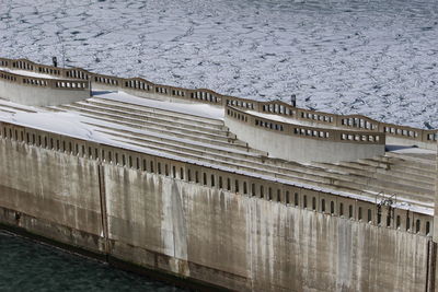 High angle view of dam by sea