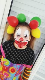 High angle view of woman dressed as clown