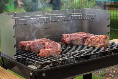 Close-up of meat on barbecue grill