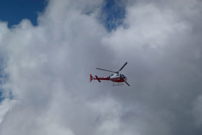 Low angle view of airplane in sky