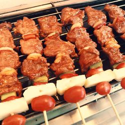 High angle view of various vegetables on barbecue grill