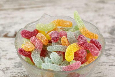 High angle view of multi colored candies on table