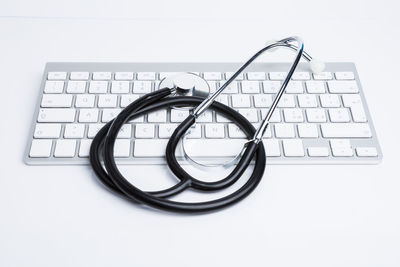 Close-up of eyeglasses on laptop