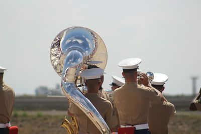 Close-up of woman against sky
