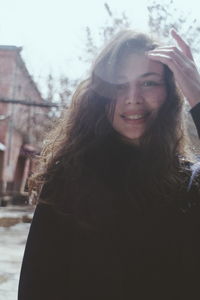 Portrait of smiling young woman