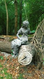 Statue of tree in forest