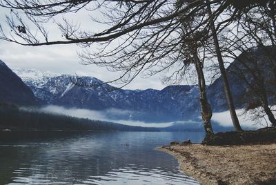 Scenic view of lake with mountains in background