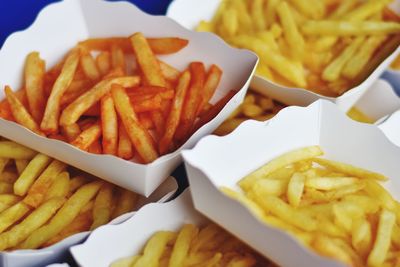 Close-up of fries with meat and sauce in plate