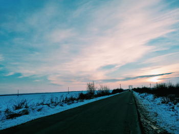 Road against sky during winter