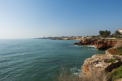 Scenic view of sea against clear sky