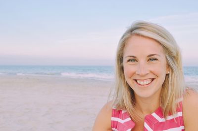 Portrait of young woman on beach