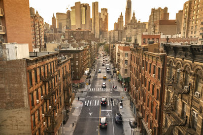 High angle view of street amidst buildings in city