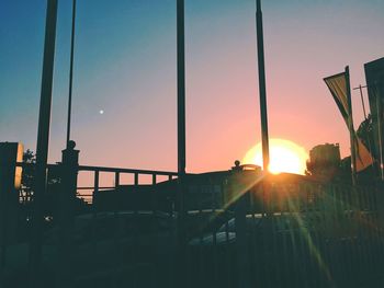 Low angle view of buildings against sky during sunset