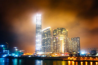 Illuminated buildings in city at night