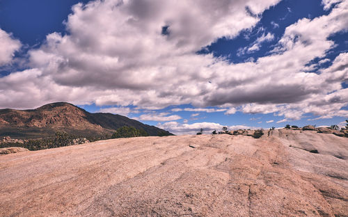 Scenic view of landscape and mountains against sky