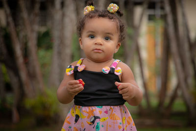 Cute girl standing at park