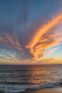 View of calm sea at sunset