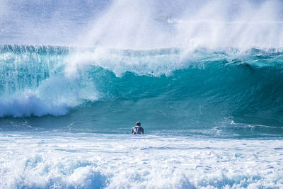 Man surfing in sea