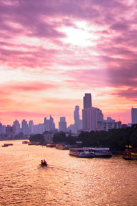 Scenic view of the chao phraya river against the sky during sunrise