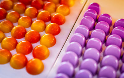 High angle view of multi colored candies on table