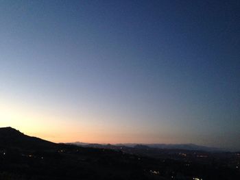 Scenic view of mountains at sunset