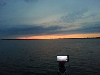 Scenic view of sea at sunset