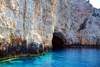 Scenic view of rock formation in sea