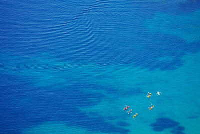 High angle view of people in sea