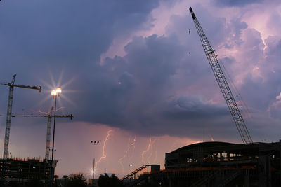 Low angle view of city at sunset