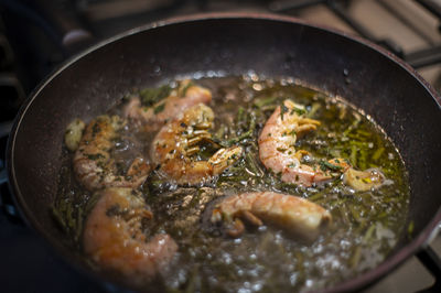 Close-up of meat in cooking pan