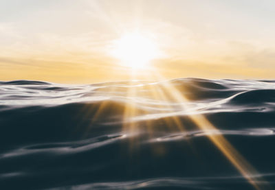 Scenic view of sunset over land