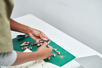 High angle view of man working on table