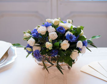 Close-up of purple flowers on table